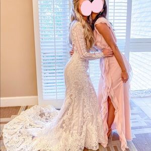 Light pink bridesmaids dress from David’s Bridal. Brand White by Vera Wang